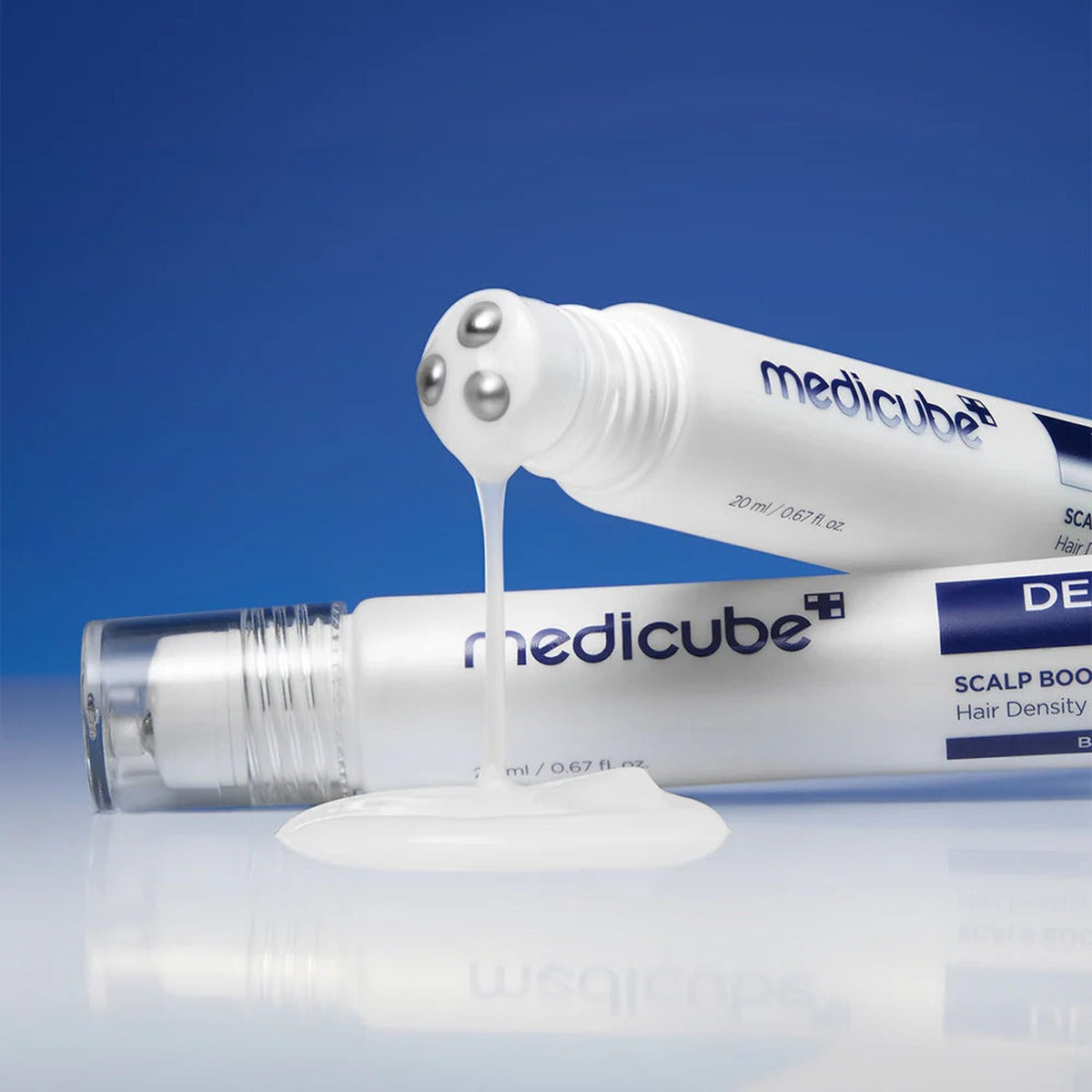 To tuber Deoxyribose Scalp Serum, serum der løber fra rullekuglerne