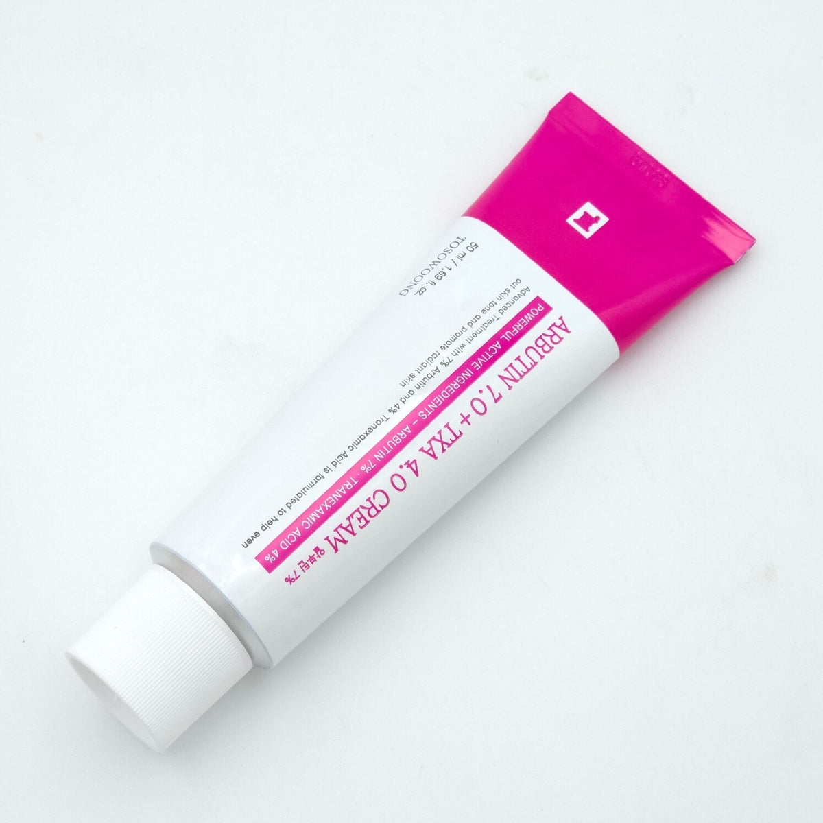 Arbutin 7.0 + TXA 4.0 Cream, liggende tube med trykt etiket