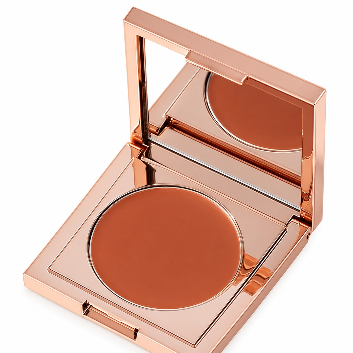 Åben kompakt med orange korrigerende concealer