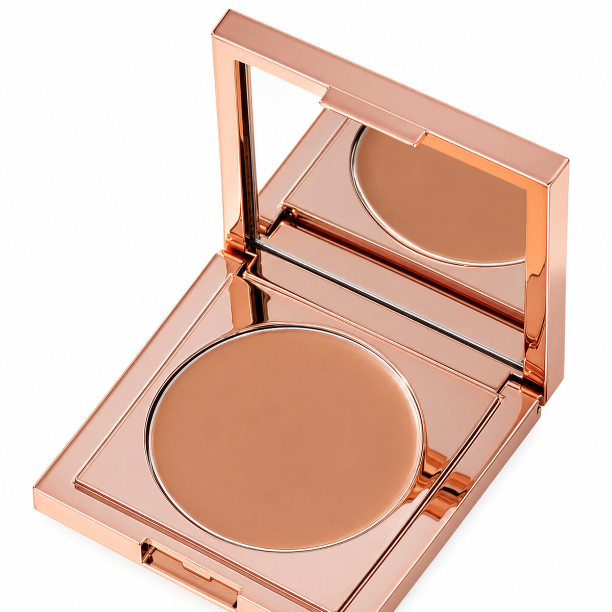 Öppen kompakt med medium-tan persika concealer