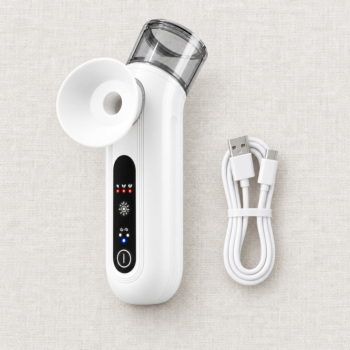Ögonvårdare och USB-laddkabel på linneunderlag